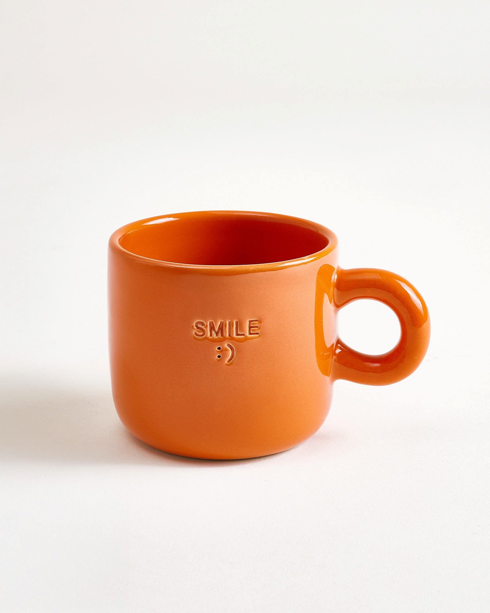 Seia kopje & schotel Smile oranje